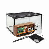 Spider terrarium kit with glass enclosure, Eco Tech Pro coco peat, 5W Reptile One heat mat, spray bottle, and tweezers for tarantula or invertebrate care.

